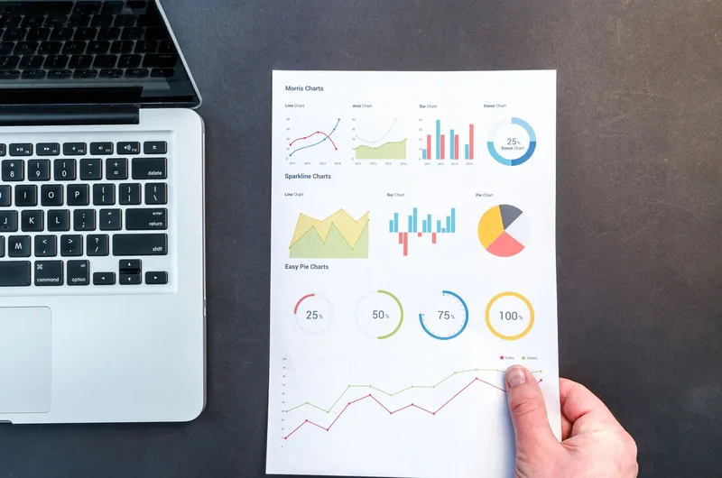 Laptop displaying an analytics dashboard with traffic data representing organic search driven email signups