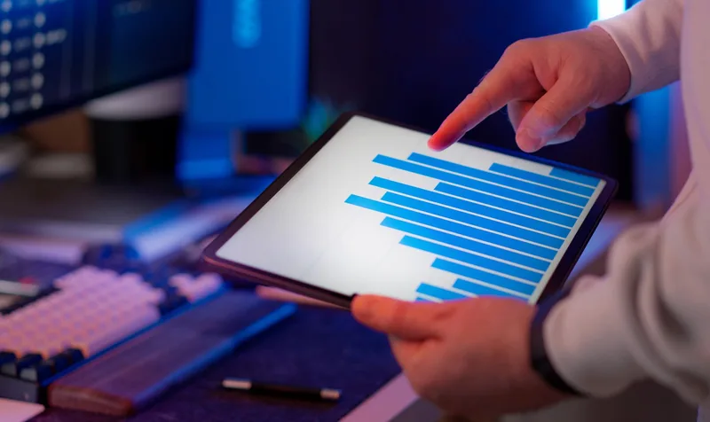 Tablet screen displaying a social media interface with engagement metrics visible