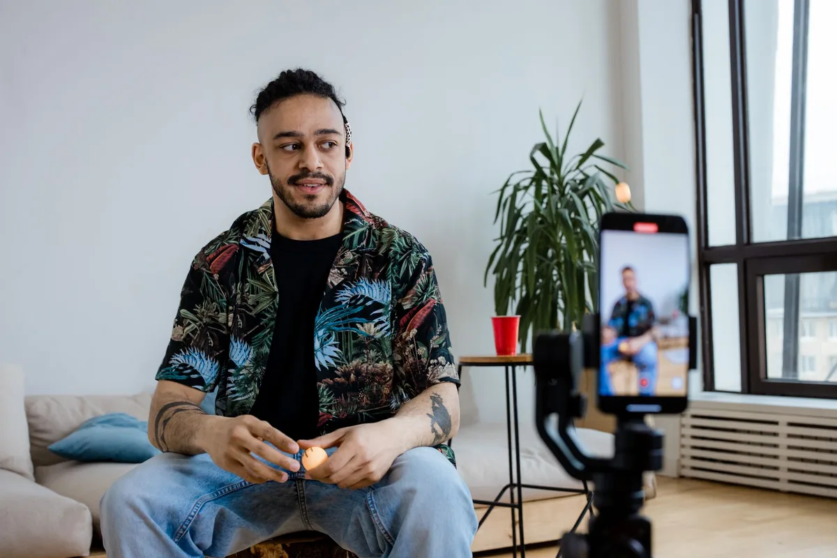 Creator filming short-form video content using a smartphone on a gimbal